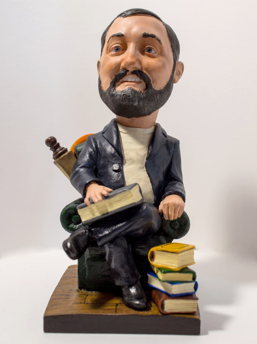 Cartoon figurine Man with Books
