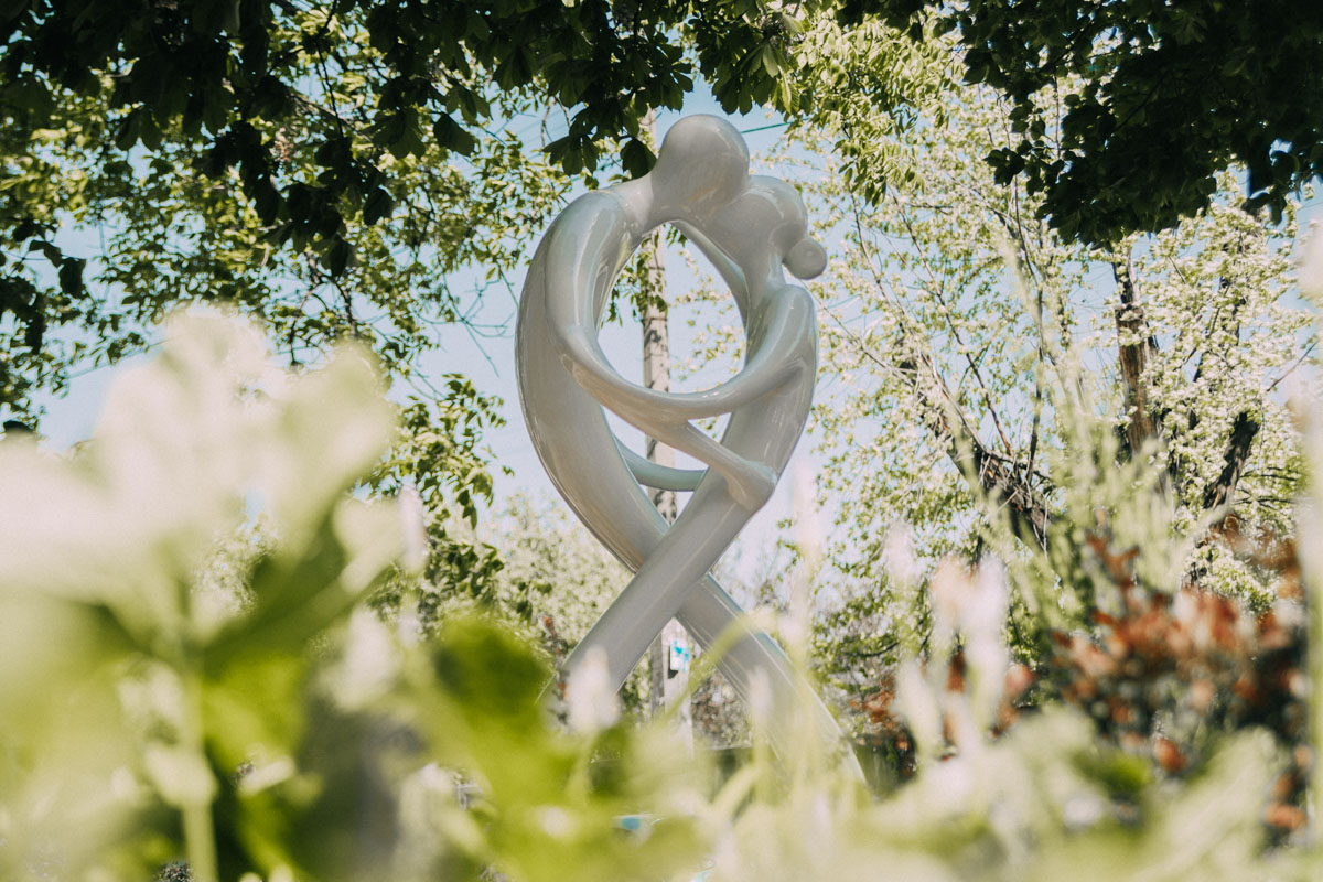 Infinity sculpture, bride and groom in love.