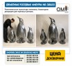 Polygonal sculptures of penguins. New Year's decorations for shopping centers.