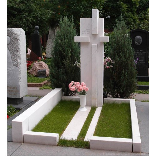 Tombstone cross made of white marble