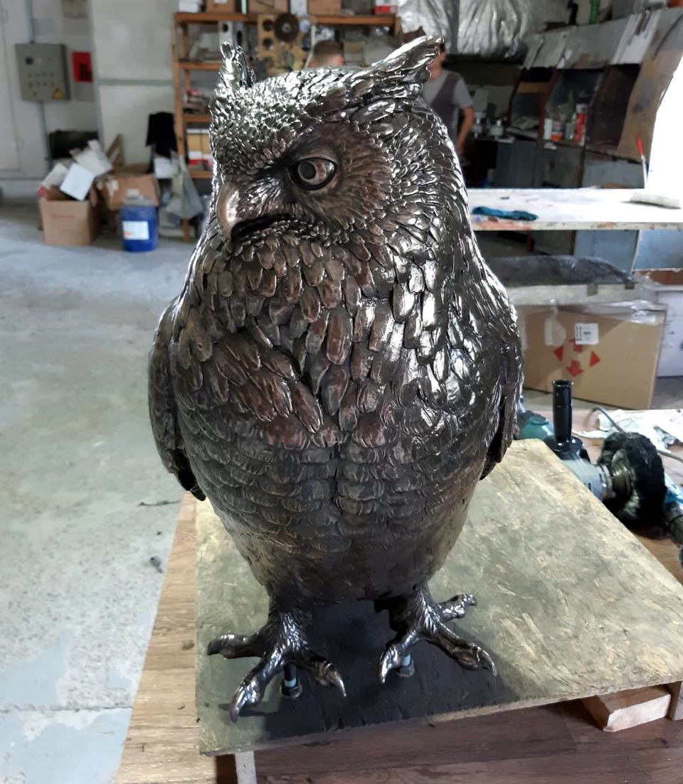 plastic sculpture of an owl