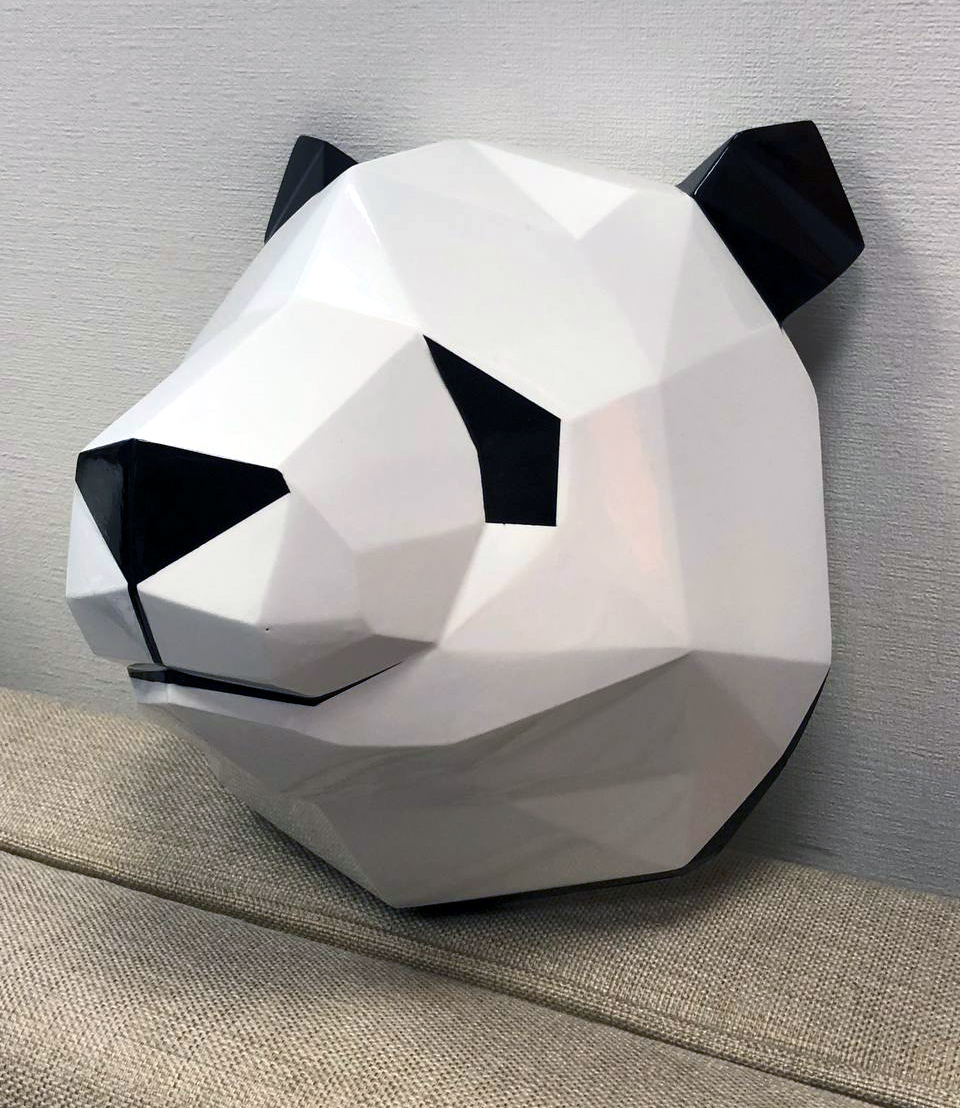 polygonal panda mask is made of plastic 